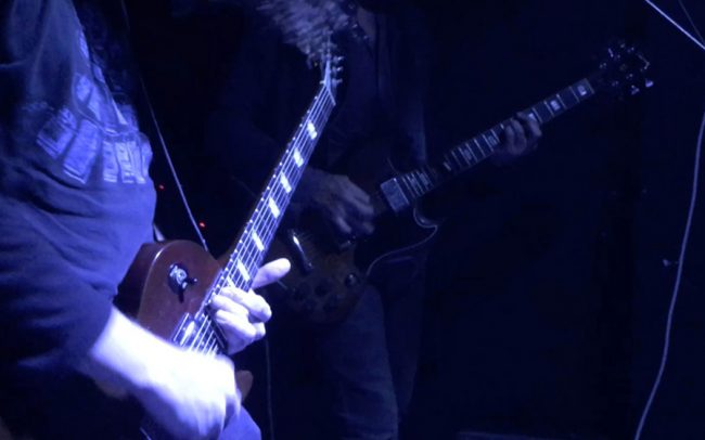 two-musicians-with-guitars